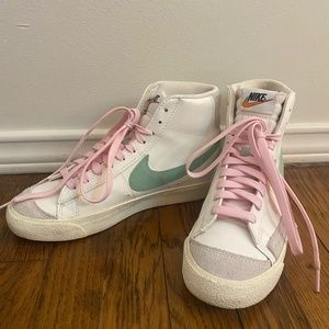 Pink and green Nike Blazers